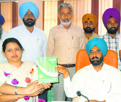 DGSE KS Pannu releases the magazine Akshi at Government Senior Secondary School for Girls, Mall Road, in Amritsar on Wednesday. 