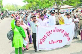 Members of the Special Trainer Teachers Union stage a protest against the state government in Bathinda on Wednesday