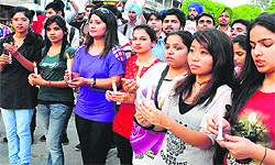 Students take out a candlelit march at Sector 17 in Chandigarh on Wednesday