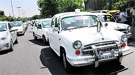 A VIP vehicle parked in the middle of the road outside St Stephens School.