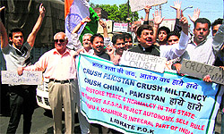 Members of the Jammu West Assembly Movement hold a protest in Jammu on Wednesday