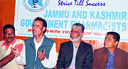 Tufail Bazar, president, Jammu and Kashmir Government Pharmacist Association addressing a press conference in Srinagar on Wednesday