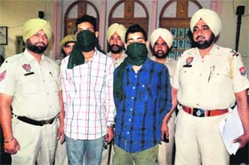 Gangsters in police custody in Ludhiana on Wednesday