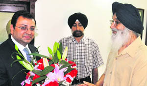Chief Minister Parkash Singh Badal welcomes Tata group chairman Cyrus Mistry in Chandigarh on Wednesday. 