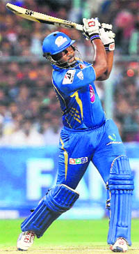 Mumbai Indians Dwayne Smith plays a shot at Eden Gardens on Wednesday.