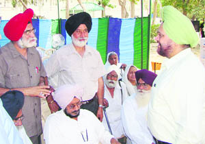 Ex-servicemen narrate their woes during the pension adalat held at Bathinda cantonment on Thursday. 