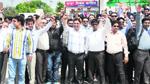 Medical representatives staging a protest outside the Civil Lines police station in Bathinda on Thursday. 