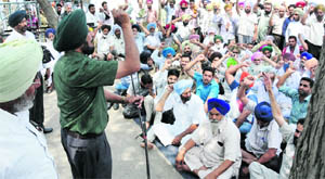 General secretary of the PRTC Workers Union, Nirmal Singh Dhaliwal, addresses a gate rally outside the PRTC workshop in Bathinda on Thursday.