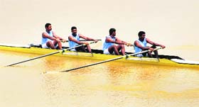 Rowers in action during the All-India Police Water Sports Championship at Sukhna Lake in Chandigarh on Thursday