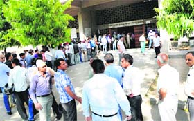 A queue of applicants seeking RCs at the office of the SDM, South, Sector 42, Chandigarh on Thursday