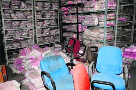 Files stacked haphazardly in the basement of the RLA office at Sector 17 in Chandigarh