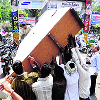 An item is removed during an anti-encroachment drive in Karnal on Thursday