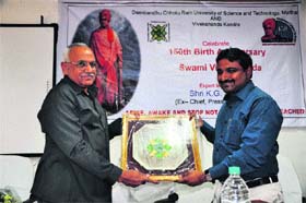 Vice-Chancellor HS Chahal (right) gives away a memento to KC Suresh, Director, Global Foundation for Civilisation Harmony, during a seminar on the DCR University of Science and Technology premises
