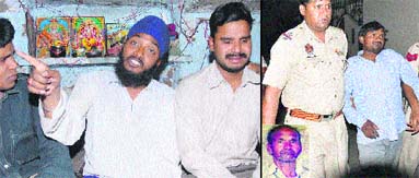 Sham Lal (centre), son of the deceased Surat Lal, narrates the sequence of events to mediapersons; police (right) takes away one of the sons of the deceased Surat Lal (inset ) for interrogation in Jalandhar on Thursday. 