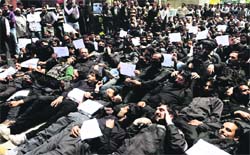 Casual employees of the Public Health Engineering Department stage a protest in Srinagar on Thursday. Photo: Yawar Kabli