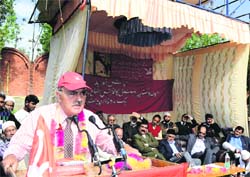 Mustafa Kamal, Additional General Secretary of NC, addresses a party workers rally at Sopore in Srinagar, on Thursday. Tribune Photo: Amin War
