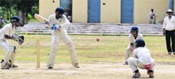 Players in action on the second day of the Ludhiana-Chandigarh match of the ML Markan Trophy meet played at Government College in Ludhiana on Thursday. A Tribune photograph
