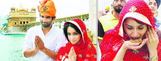 Bollywood actors Aditya Roy Kapoor and Shraddha Kapoor pay obeisance at the Golden Temple; and (right) Shraddha partakes of parshad in Amritsar on Friday.