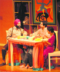 Artistes stage a play Khajoor te Atkeya during the third TFT Baisakhi Theatre Festival at Tagore Theatre on Friday.