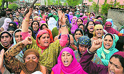 Locals protest in Pampore on Friday