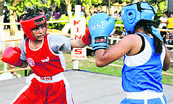 Boxers in action during the first day of the three-day 14th Senior State Women Boxing Championship near Jalandhar on Friday