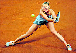 Maria Sharapova in action against Lucie Safarova