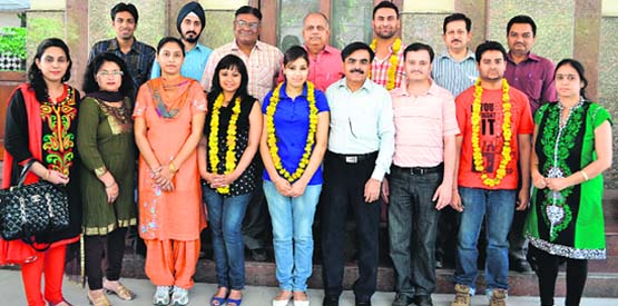 Meritorious students being felicitated at DAV College in Amritsar. A tribune photograph
