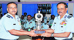 Air Chief NAK Browne, the Chief of Air Staff, Indian Air Force, hands over trophy for the best operational transport base to Air Commodore SC Chafekar, Air Officer Commanding Wing in Chandigarh, on Saturday