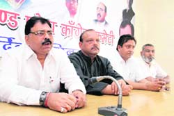 Ashok Verma, leader of the opposition in the Dehradun Municipal Corporation, addresses the media in Dehradun on Saturday. Tribune photo: Vinod Pundir