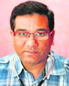 Dr Anil Bhatt