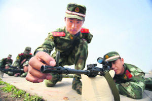 Chinese paramilitary policemen snipers during an annual drill in Nanjing, Jiangsu province. 