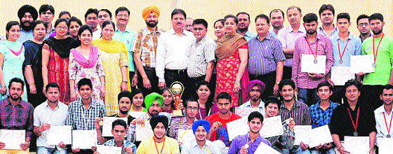 Students of Mehr Chand Polytechnic College in a jubilant mood after bagging the overall State Tech Fest Trophy in the inter-polytechnic competition held in Jalandhar. 