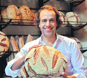 Alain Coumont, a Belgian has set up Le Pain Quotidien. His bread cafe in Colaba, Mumbai, has a Belgian, farmhouse-like atmosphere 