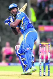 Dwayne Smith hits a shot in Mumbai on Saturday. 