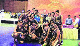 Welham boys lift the All-India Golden Jubilee Basketball Tournament trophy in Dehradun on Sunday.
