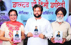Dr Harshinder Kaur, a social activist, releases a book by Hans Raj Hans and Surjit Patar in Jalandhar