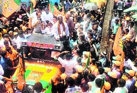 BJP national vice-president Mukhtar Abbas Naqvi addresses an election rally in Bangalore on Sunday
