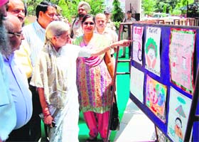Taking a close look: BJP national vice-president Laxmi Kanta Chawla during a district-level workshop organised by the Health Department in Amritsar on Monday