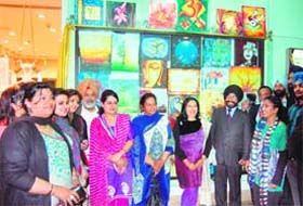 Wall of Art at Alpha One Mall displays a collection of works by city-based artists
