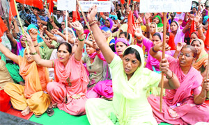 Members of Safai Mazdoor Union, Punjab, hold a dharna outside the Bathinda Municipal Corporation office on Monday. 