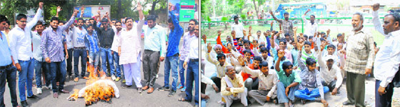 Members of the Akhil Bharatiya Vidyarthi Parishad (ABVP) burn an effigy of the Central Government in Bathinda on Monday. The ABVP workers were protesting against the reported Chinese incursion inside the Indian territory in Ladakh. brick kiln labourers (right) hold a protest outside the District Administrative Complex seeking monetary benefits.