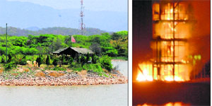 The island which used to house the watch tower (right) that was gutted in a fire at the Sukhna Lake in 2009. 