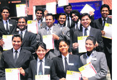 Students of the Chandigarh Institute of Hotel Management with C-TOSS certificates and assessment cards at a function on Monday.