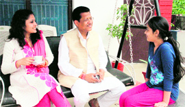 Congress mayoral candidate from Dehradun Suryakant Dhasmana relaxes with his wife.