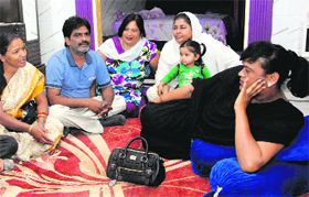 BSP mayoral candidate Rajni Rawat with her supporters in Dehradun on Monday.