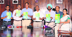 Dr VK Bahuguna (third from left), Director General, ICFRE, releases a booklet on Forestry research : ICFRE-supporting rural and tribal livelihood in Dehradun on Monday.