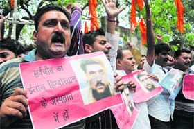 The Shiv Sena Dogra Front members protest in Jammu on Monday