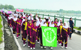 School students take part in a marathon, Proudly Kashmiri 2013, in Srinagar on Monday.