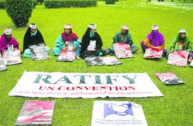 Relatives of missing persons during a sit-in demonstration in Srinagar on Monday