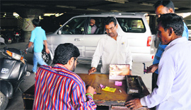 MC staff at the multi-level parking lot near MC Zone A office in Ludhiana.